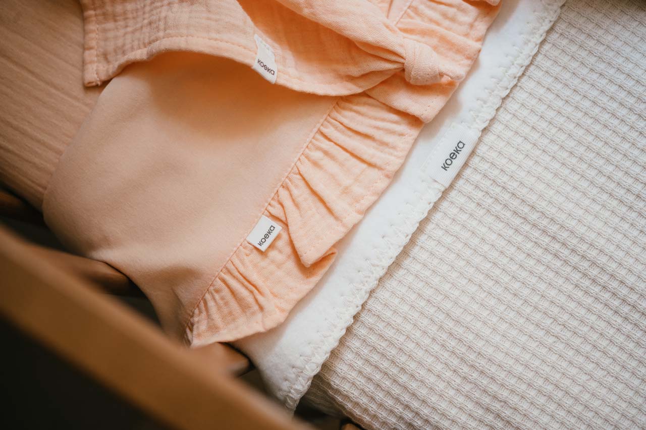 Drap berceau et drap-housse ruffle combi Faro peach