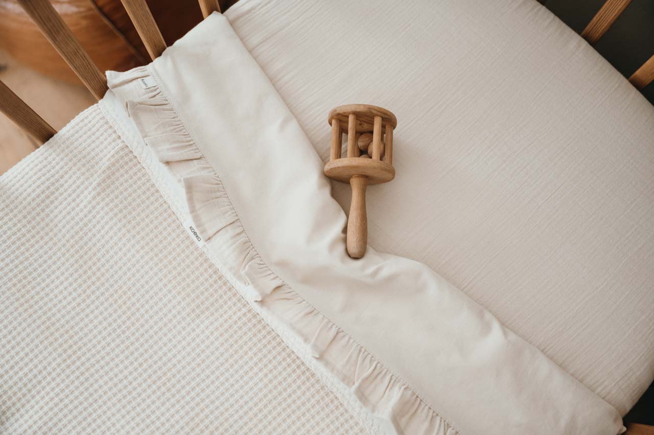 Wiegdeken Cotton Fleece Malaga warm white